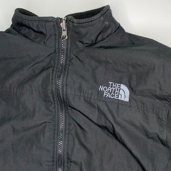 The North Face reversible black size large kids